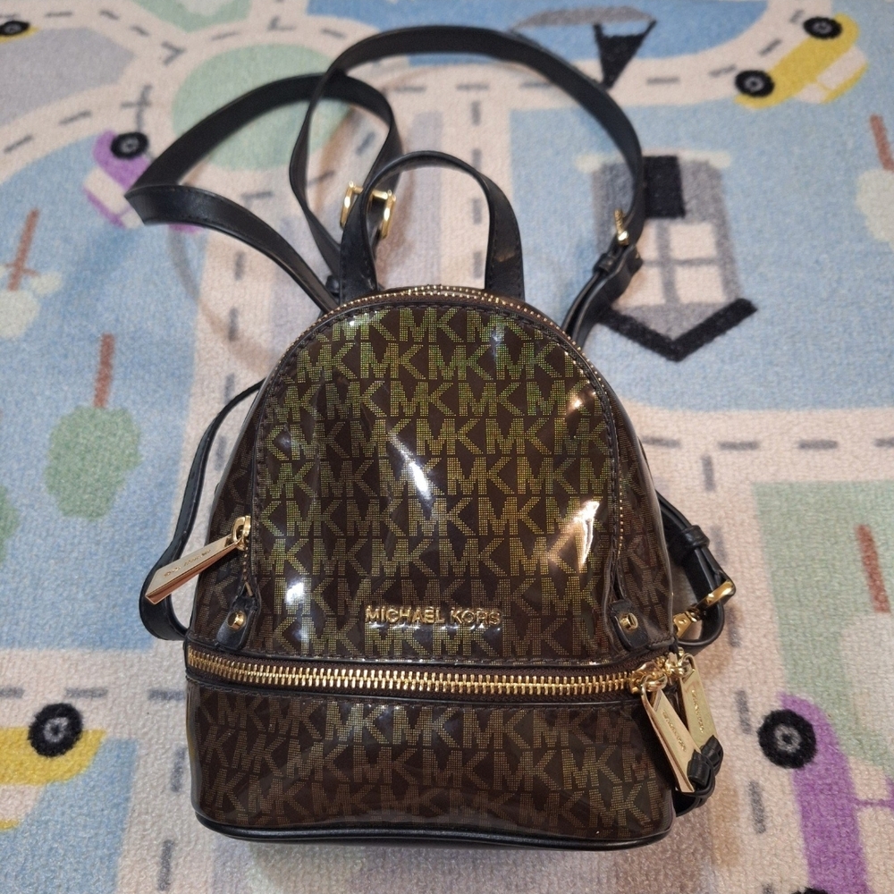 Michael Kors Monogram Brown and Gold Backpack